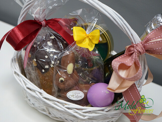 Easter Composition with Champagne and Sweets photo